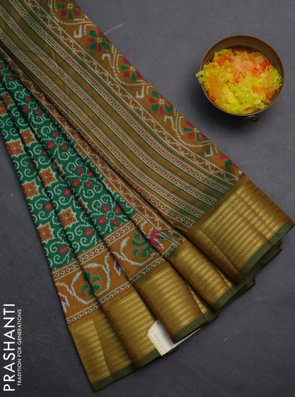 Semi tussar saree green and mustard yellow with allover ikat prints and zari woven border