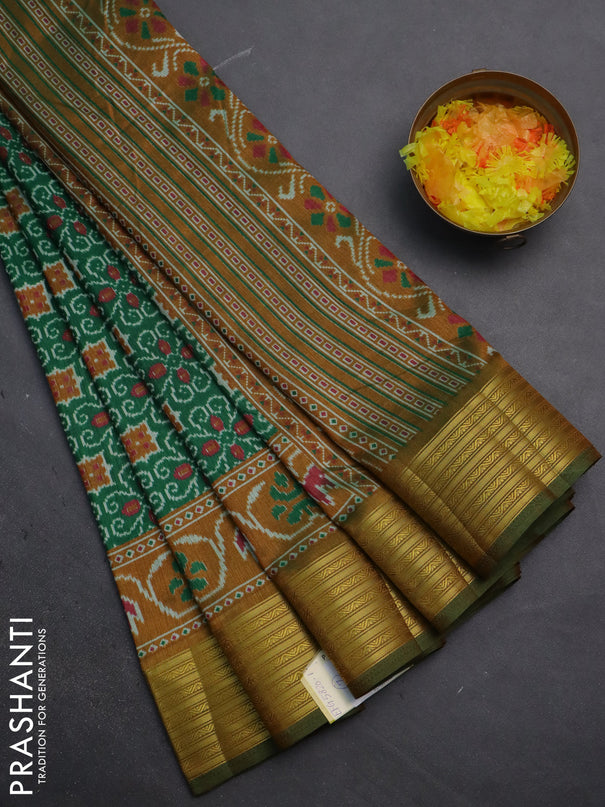 Semi tussar saree green and mustard yellow with allover ikat prints and zari woven border