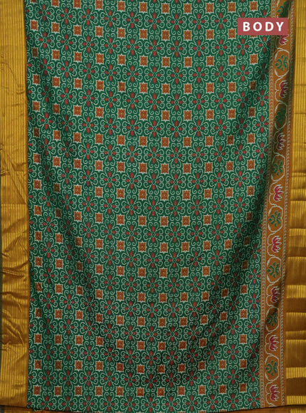 Semi tussar saree green and mustard yellow with allover ikat prints and zari woven border