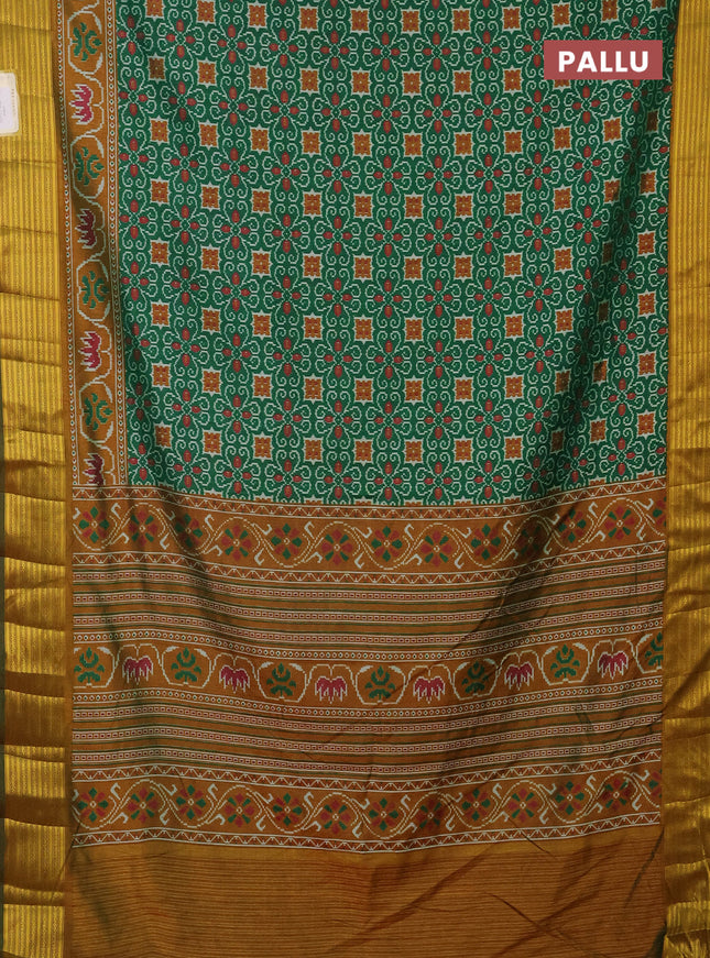 Semi tussar saree green and mustard yellow with allover ikat prints and zari woven border