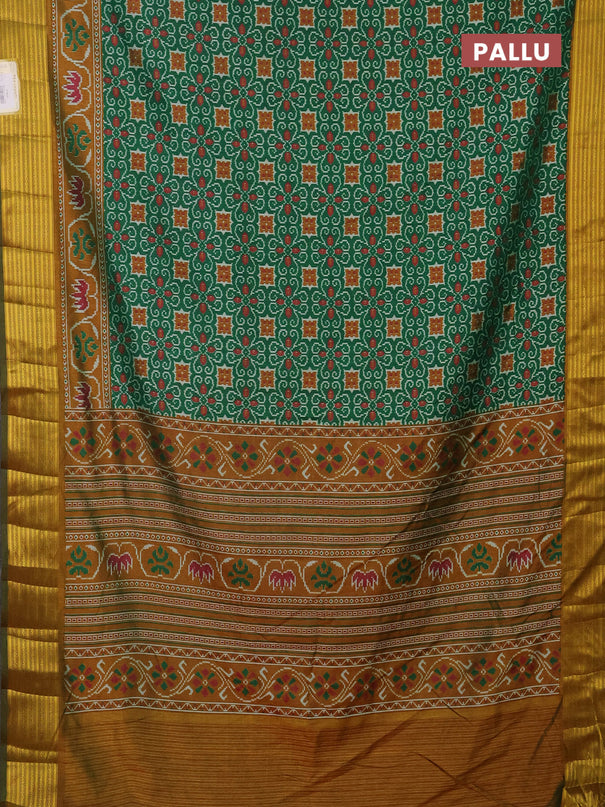 Semi tussar saree green and mustard yellow with allover ikat prints and zari woven border
