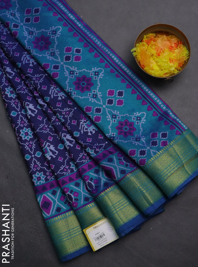 Semi tussar saree dark blue and teal blue with allover patola prints and zari woven border