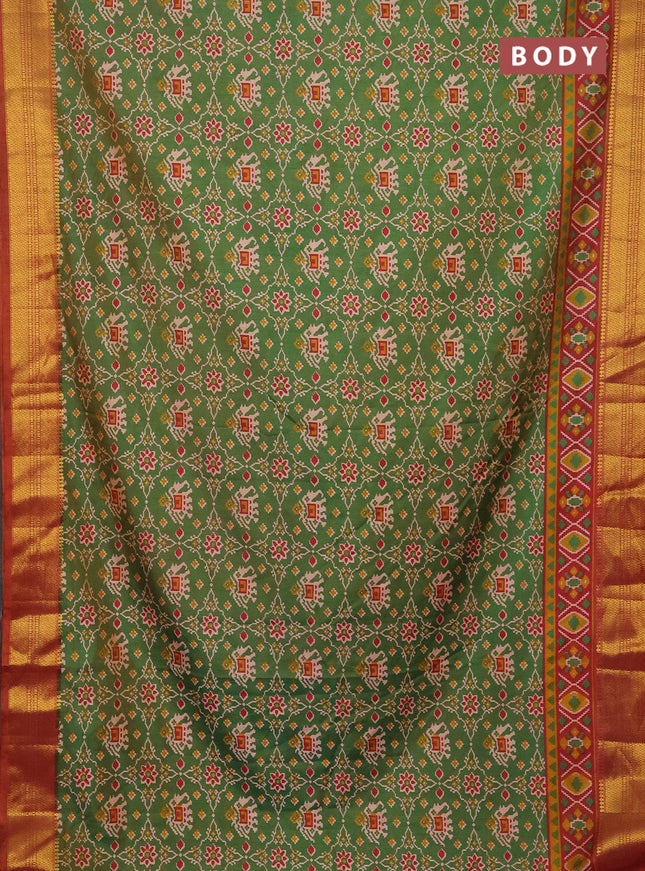 Semi tussar saree dual shade of green and dual shade of rust with allover patola prints and zari woven border