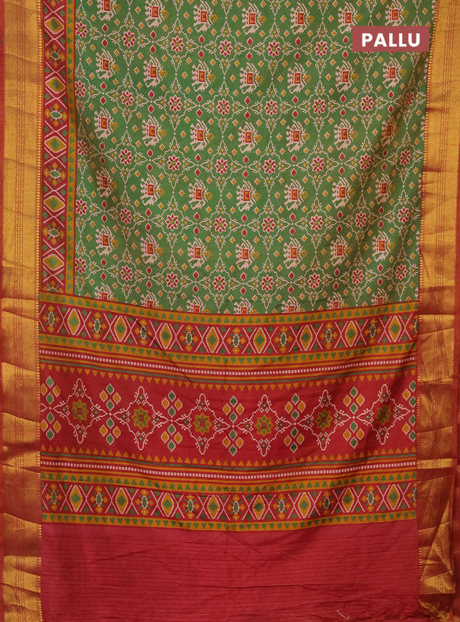 Semi tussar saree dual shade of green and dual shade of rust with allover patola prints and zari woven border