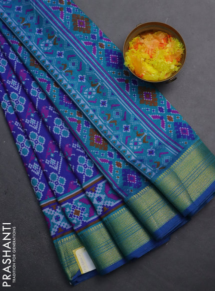 Semi tussar saree blue and teal blue with allover patola prints and zari woven border