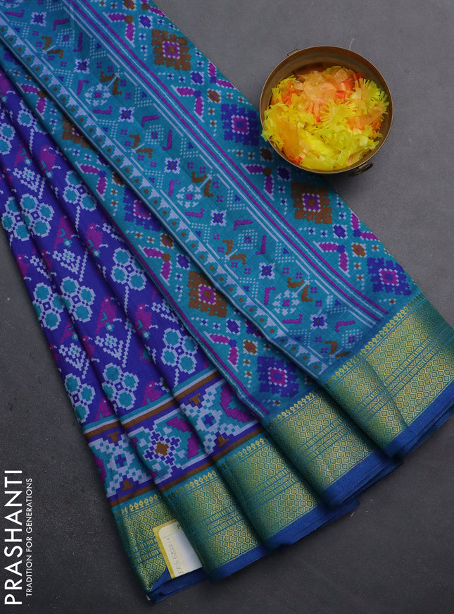 Semi tussar saree blue and teal blue with allover patola prints and zari woven border
