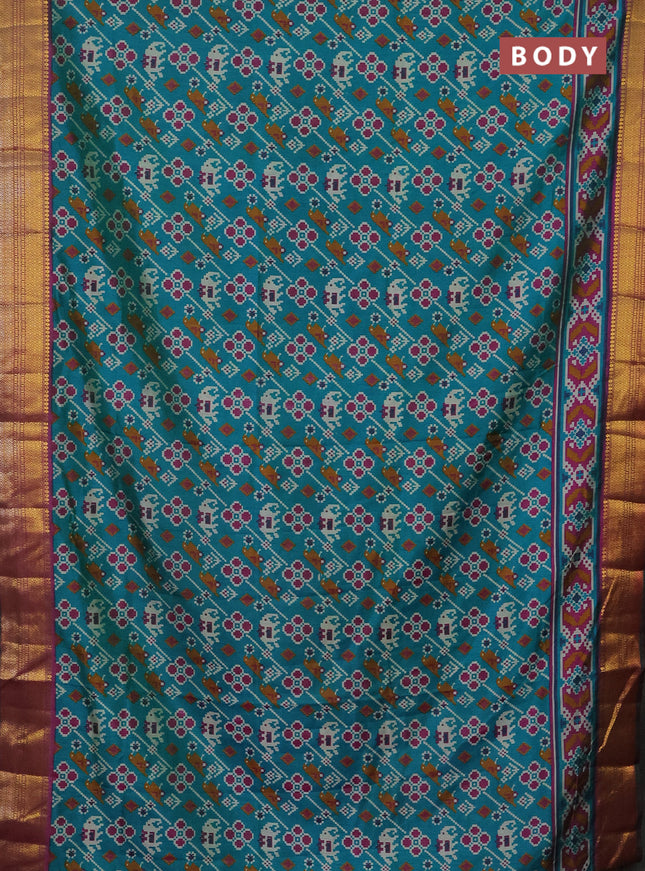 Semi tussar saree teal blue and purple with allover patola prints and zari woven border