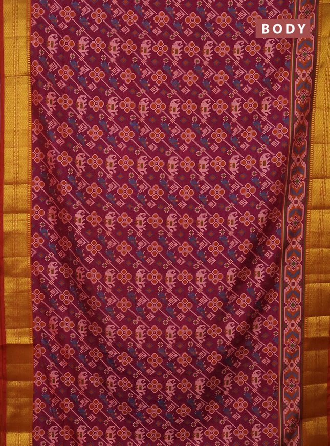 Semi tussar saree dark magenta pink and rust shade with allover patola prints and zari woven border
