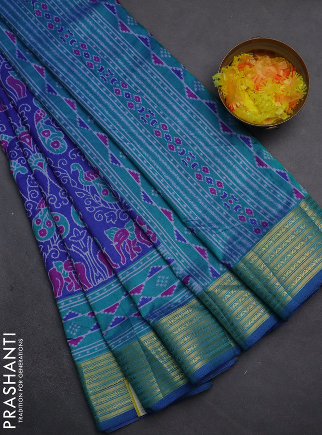 Semi tussar saree blue and teal bluish green with allover ikat prints and zari woven border