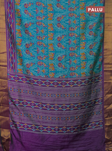Semi tussar saree teal green and purple with allover ikat prints and zari woven border
