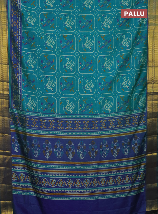 Semi tussar saree teal green and dual shade of blue with allover ikat prints and zari woven border