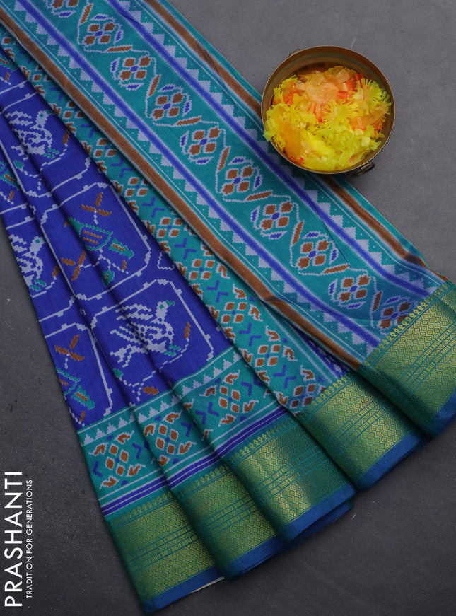 Semi tussar saree blue and teal greenish blue with allover ikat prints and zari woven border