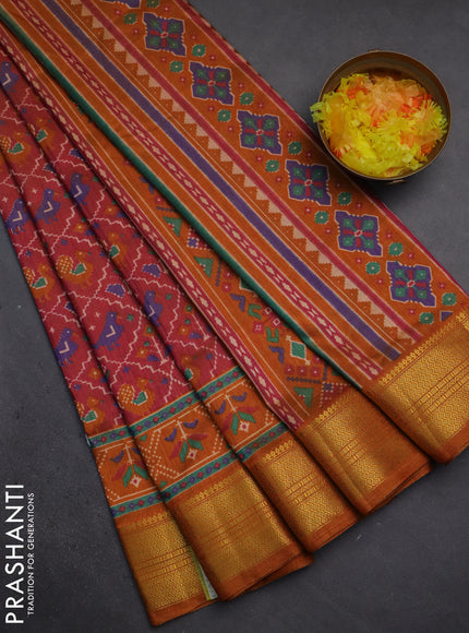 Semi tussar saree dual shade of pink and dark mustard with allover patola prints and zari woven border