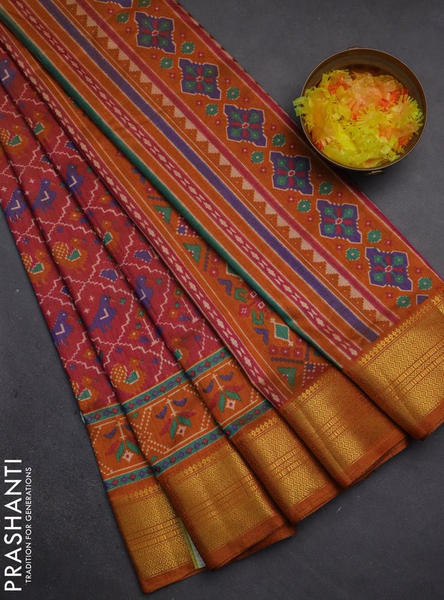 Semi tussar saree dual shade of pink and dark mustard with allover patola prints and zari woven border