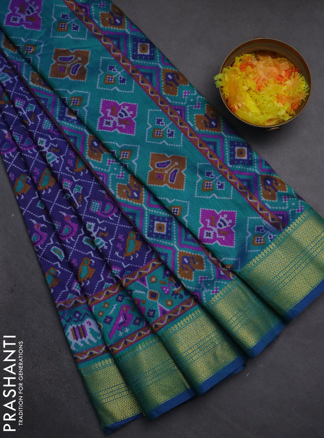 Semi tussar saree dark blue and teal green with allover patola prints and zari woven border
