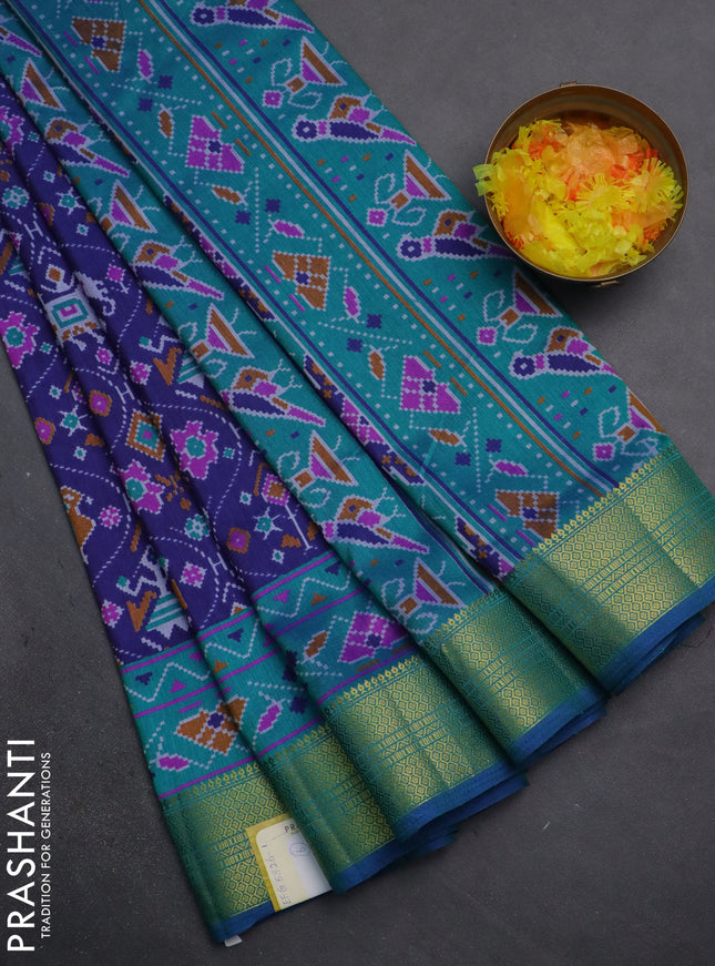 Semi tussar saree dark blue and teal green with allover patola prints and zari woven border