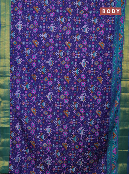 Semi tussar saree dark blue and teal green with allover patola prints and zari woven border