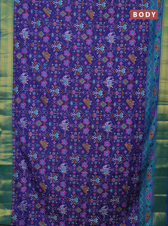 Semi tussar saree dark blue and teal green with allover patola prints and zari woven border