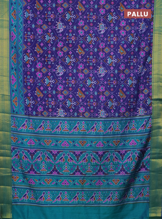 Semi tussar saree dark blue and teal green with allover patola prints and zari woven border