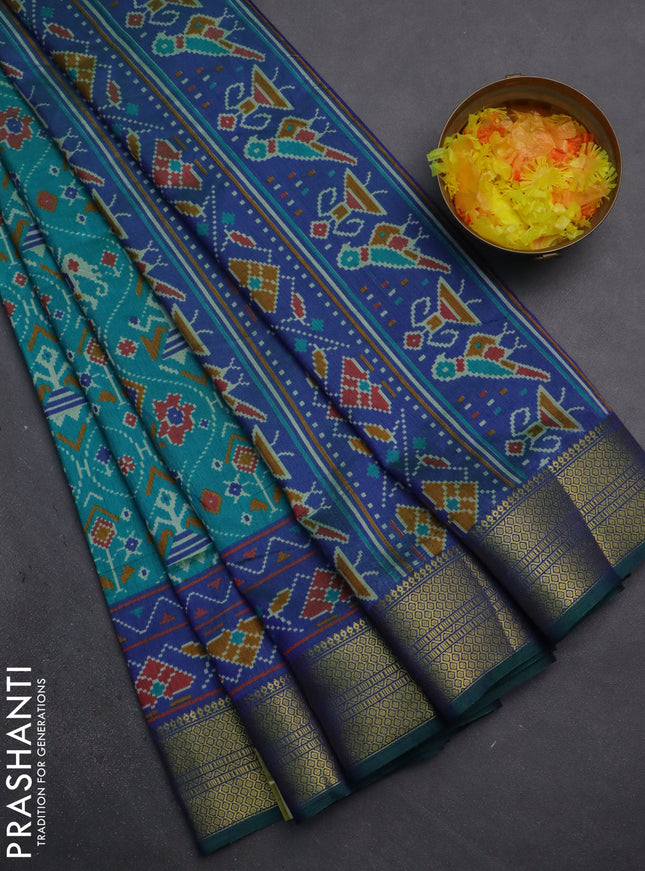 Semi tussar saree teal bluish green and dual shade of violet with allover patola prints and zari woven border