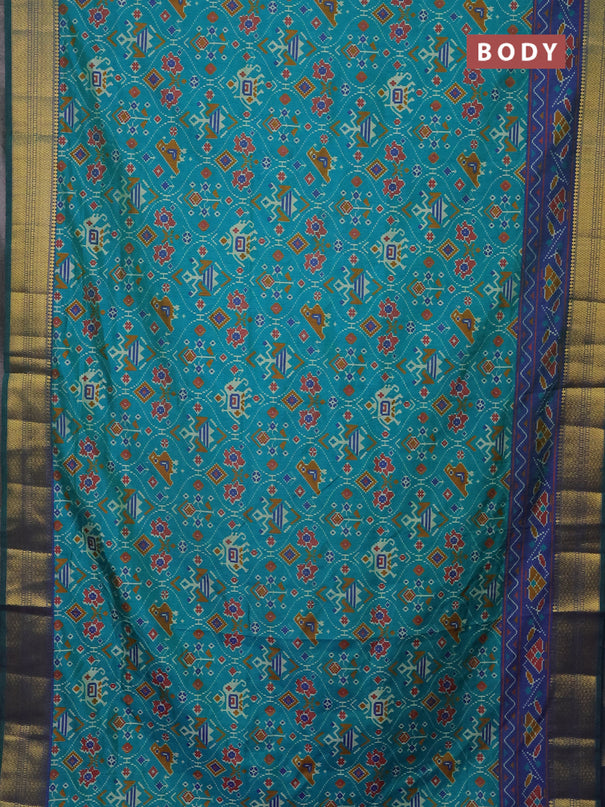 Semi tussar saree teal bluish green and dual shade of violet with allover patola prints and zari woven border