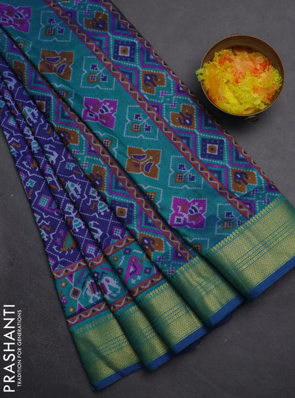 Semi tussar saree dark blue and teal green with allover patola prints and zari woven border