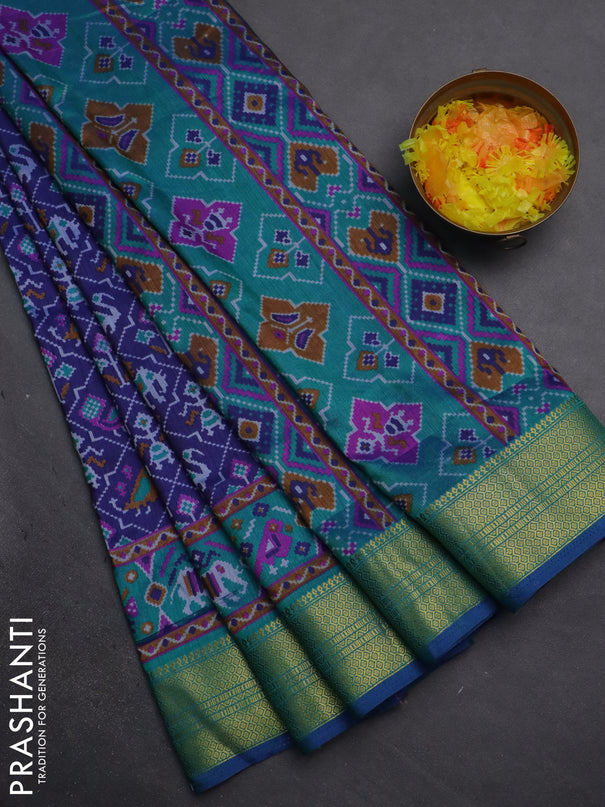 Semi tussar saree dark blue and teal green with allover patola prints and zari woven border