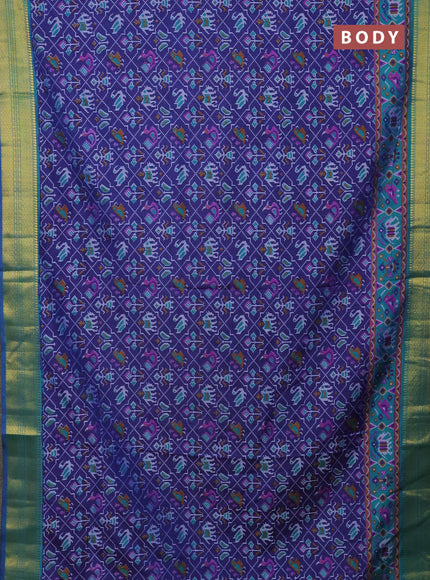 Semi tussar saree dark blue and teal green with allover patola prints and zari woven border