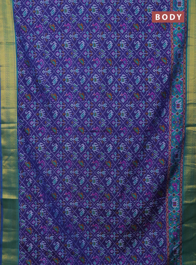 Semi tussar saree dark blue and teal green with allover patola prints and zari woven border