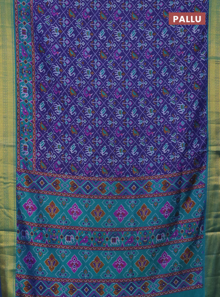 Semi tussar saree dark blue and teal green with allover patola prints and zari woven border