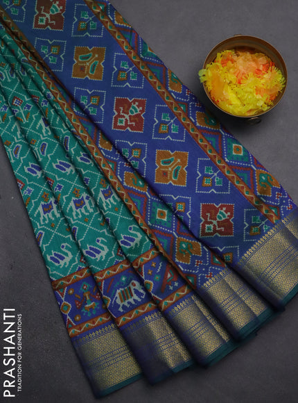 Semi tussar saree teal green and dual shade of blue with allover patola prints and zari woven border