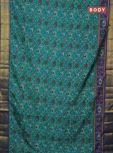 Semi tussar saree teal green and dual shade of blue with allover patola prints and zari woven border
