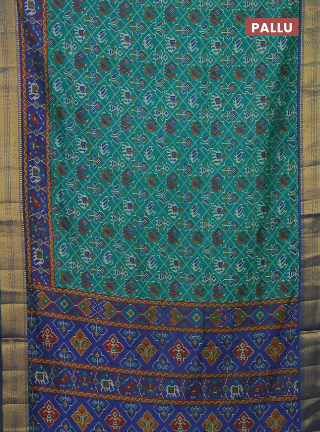 Semi tussar saree teal green and dual shade of blue with allover patola prints and zari woven border
