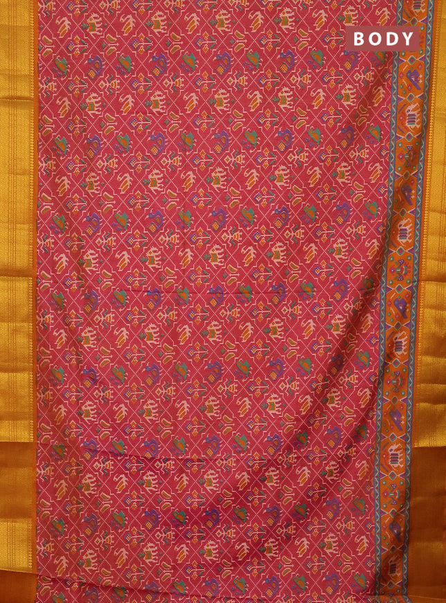 Semi tussar saree dual shade of pink and dark mustard with allover patola prints and zari woven border