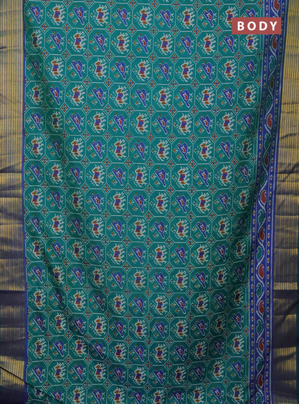 Semi tussar saree teal green and blue with allover patola prints and zari woven border