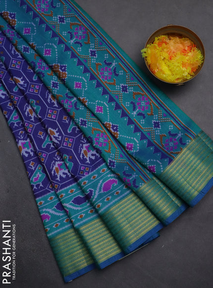 Semi tussar saree dark blue and teal green with allover patola prints and zari woven border