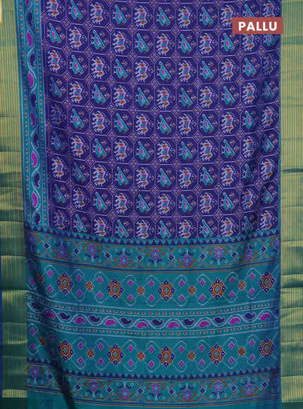 Semi tussar saree dark blue and teal green with allover patola prints and zari woven border
