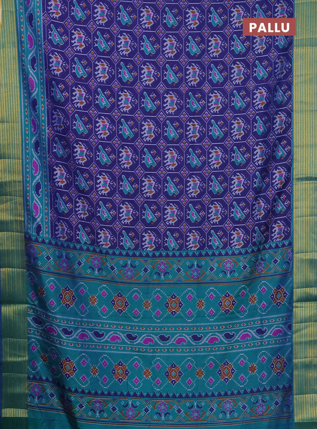 Semi tussar saree dark blue and teal green with allover patola prints and zari woven border