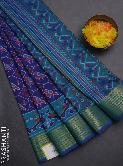 Semi tussar saree blue and teal blue with allover patola prints and zari woven border