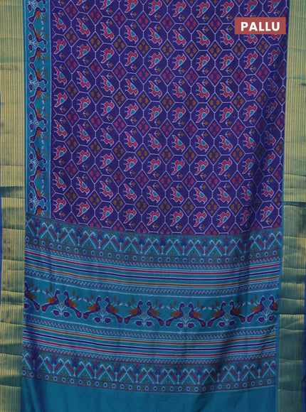 Semi tussar saree blue and teal blue with allover patola prints and zari woven border