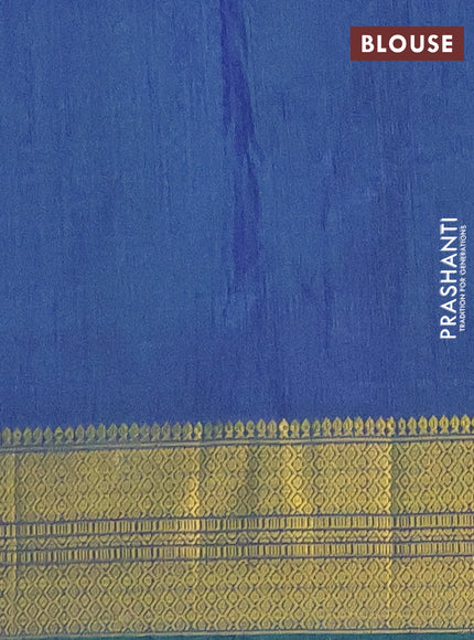 Semi tussar saree teal green and blue with allover patola prints and zari woven border