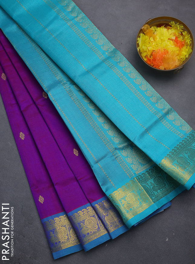 Silk cotton saree dual shade of purple and teal blue with zari woven buttas and zari woven border