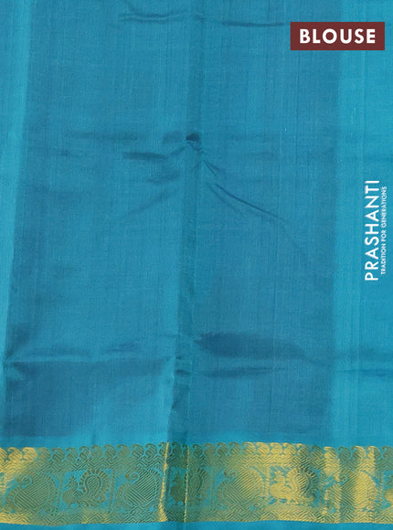 Silk cotton saree dual shade of purple and teal blue with zari woven buttas and zari woven border