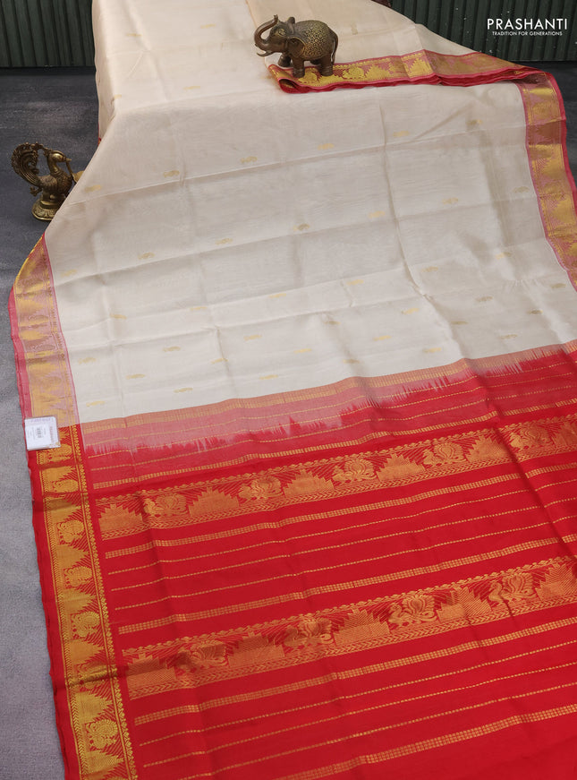 Silk cotton saree cream and red with zari woven paisley buttas and zari woven border
