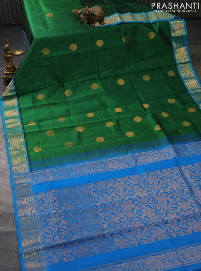 Silk cotton saree green and cs blue with zari woven geometric buttas and rich zari woven border