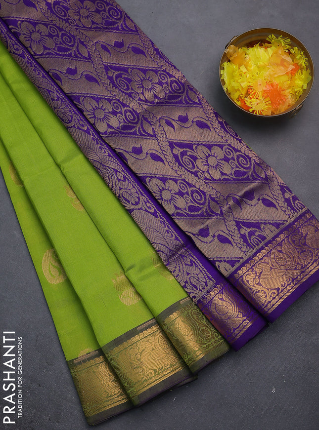 Silk cotton saree light green and blue with zari woven buttas and zari woven annam border