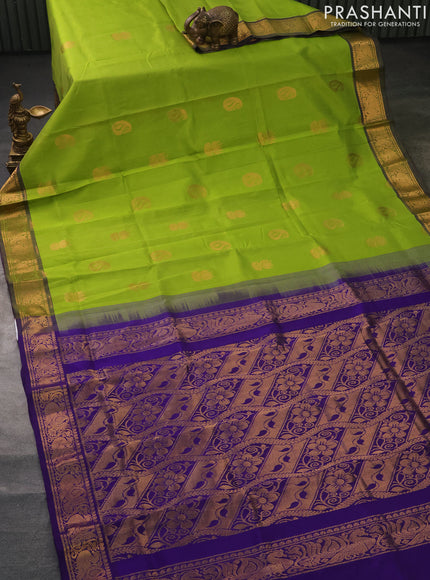 Silk cotton saree light green and blue with zari woven buttas and zari woven annam border