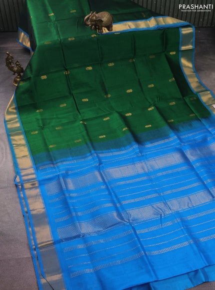 Silk cotton saree green and cs blue with zari woven floral buttas and zari woven border