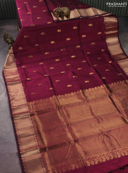 Silk cotton saree wine shade with paisley zari woven buttas and zari woven border