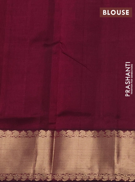 Silk cotton saree wine shade with paisley zari woven buttas and zari woven border